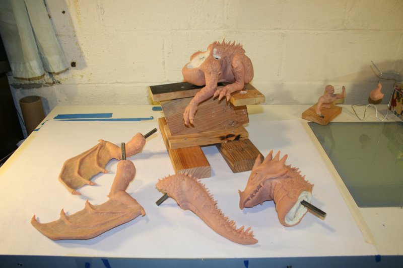 finished dragon sculpture shown disassembled into its five pieces
