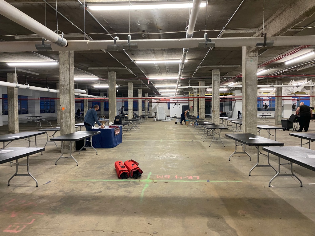 bare vendor tables setup before a convention