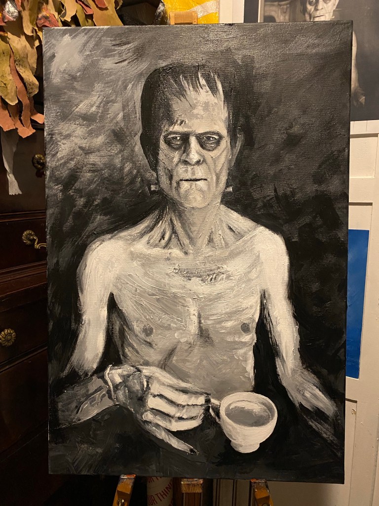 black and white acrylic painting of Boris Karloff as Frankenstein's monster, behind the scenes holding a cup of tea