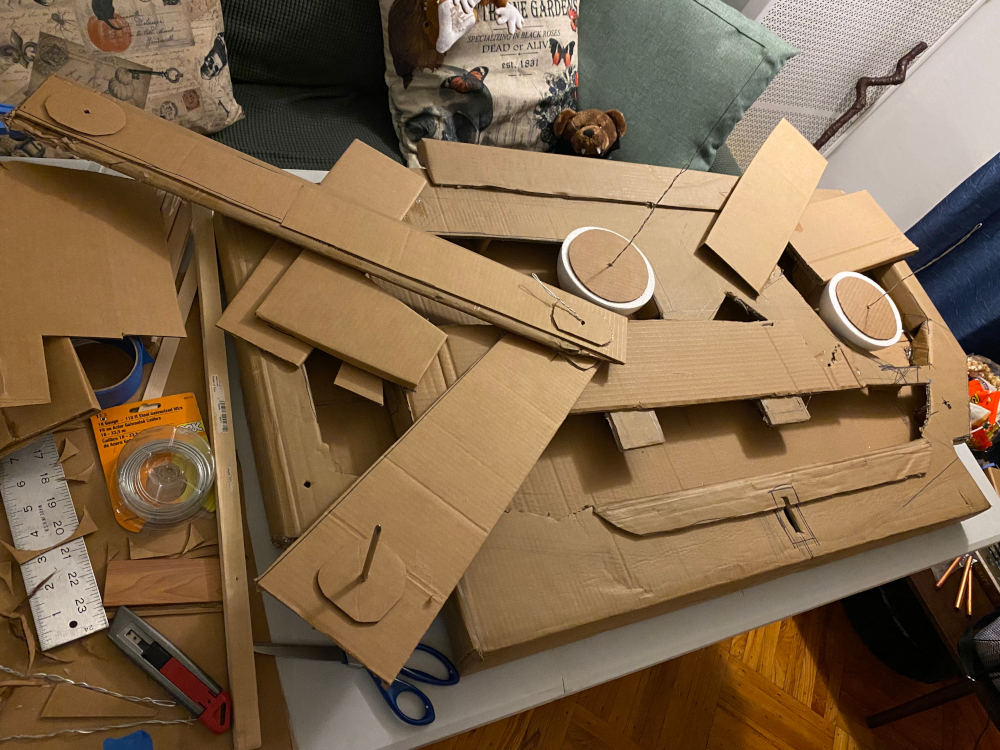 carboard puppet showing eye and mouth mechanisms